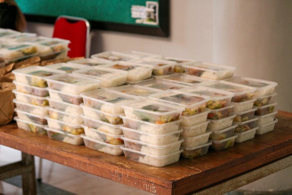 Stacked meal prep containers ready for freezer storage