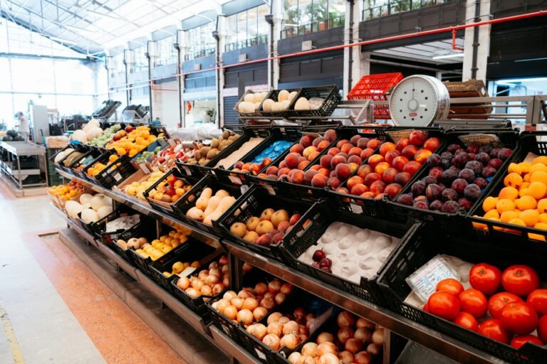 Fresh produce displayed at a grocery store, symbolizing affordable meal planning.