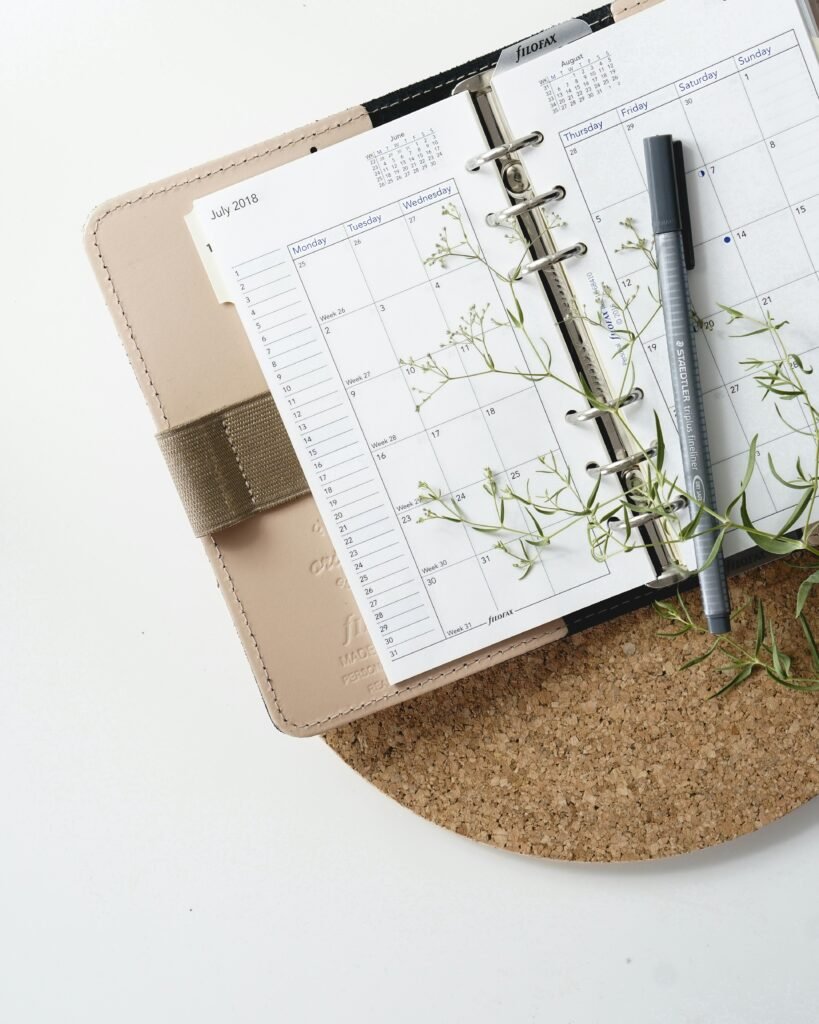 time blocking with a paper planner and notes