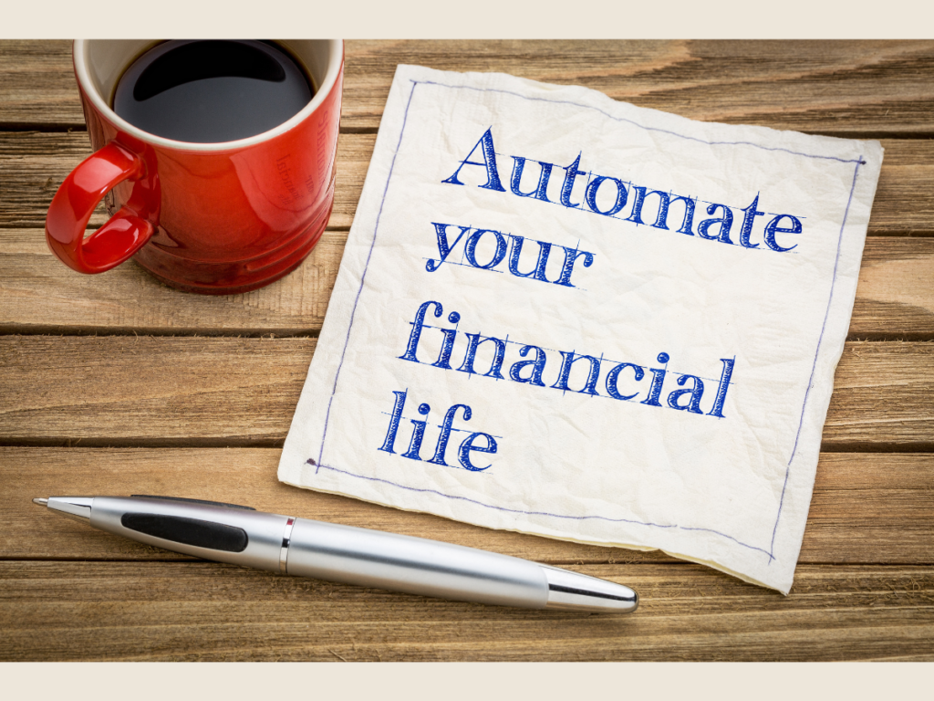 Automate finances notebook on desk, symbolizing financial minimalism and building wealth through simplicity through automation.