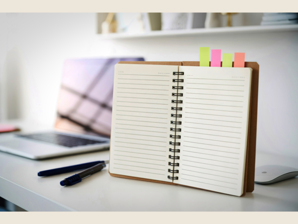 Financial minimalism mindset with open notebook and pen, showing how to simplify finances and focus on what matters most.