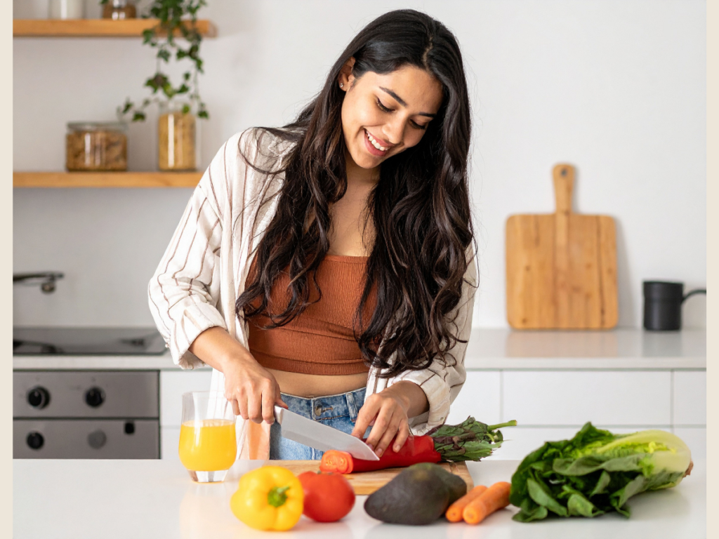 Person preparing fresh vegetables for freezer meal prep, starting a new meal planning routine at home.