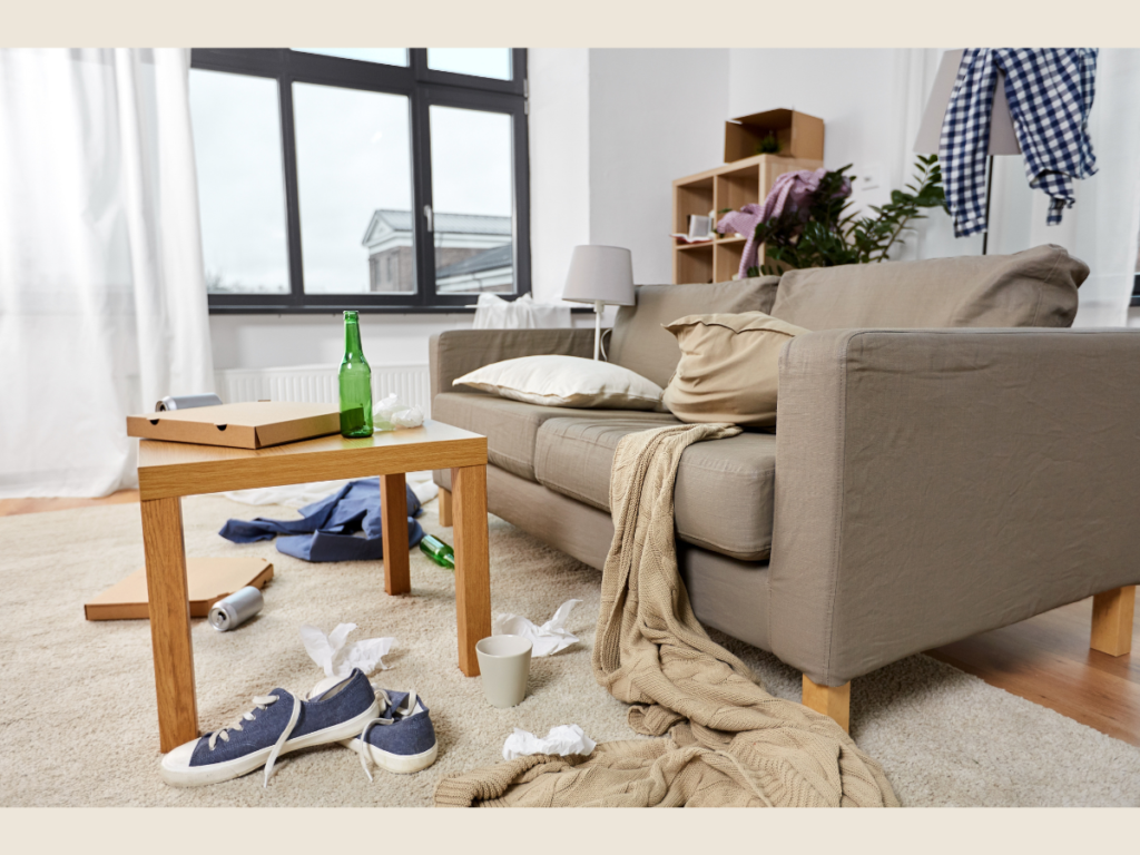 Messy living room showing the hidden tax of clutter in minimalist living.