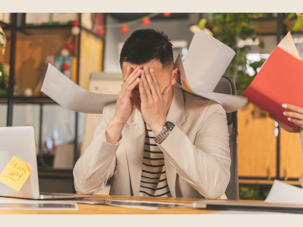 Stressed freelancer realizing passive income myths and the reality of effort