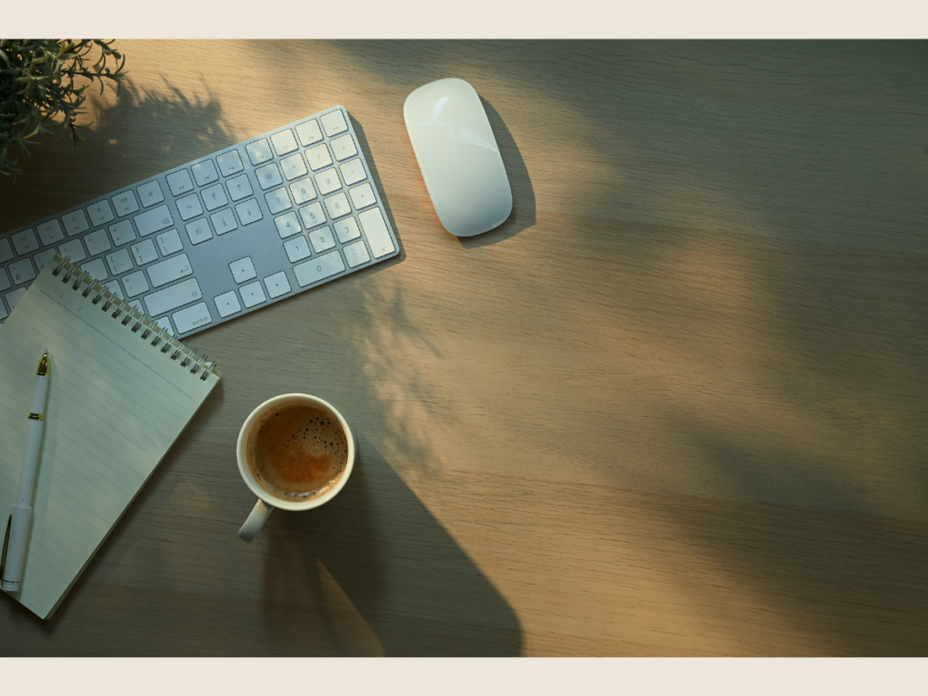 Minimalist workspace with coffee and notebooks symbolizing passive income and focus