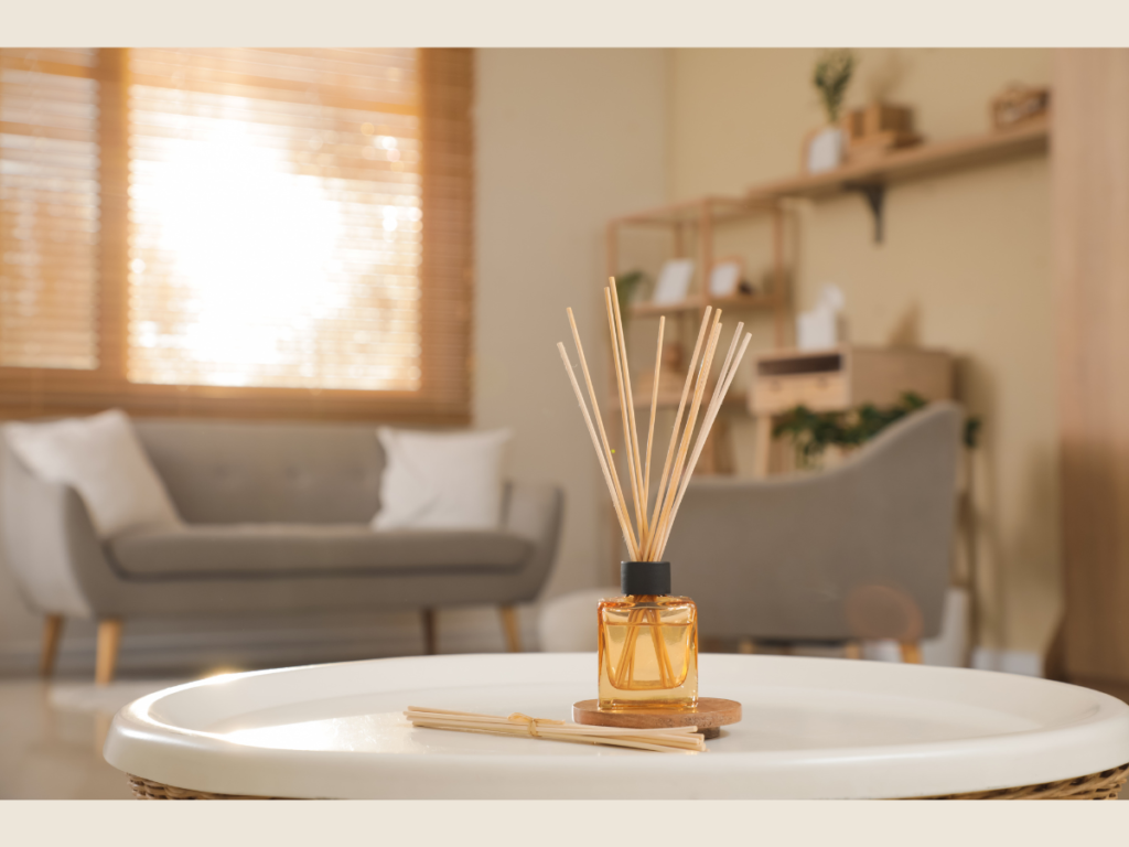 essential oil diffuser in cozy minimalist living room showing intentional spending habits and saving money ideas